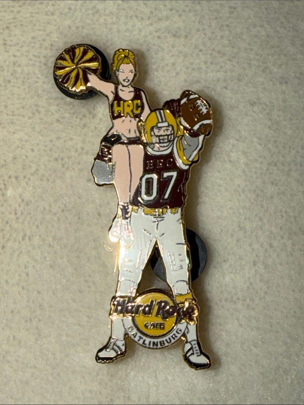 Hard Rock Cafe Gatlinburg Football Player Holding Cheerleader